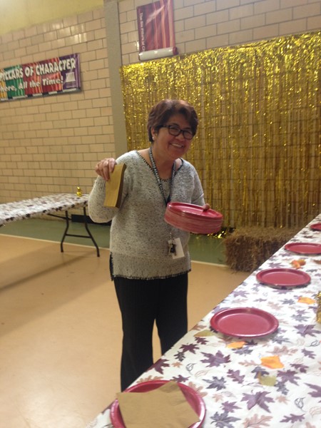 Mrs. DeArmas -Behind the scenes, setting up for the Fall Ball.